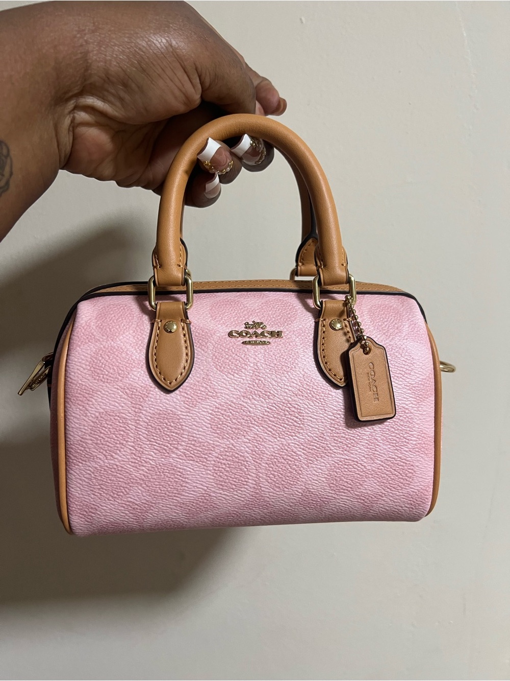 coach powder pink mini rowan